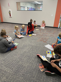 Kindergartners are doing a group activity.