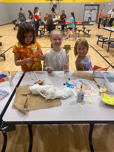 Students working on crafts during Family Fun Night.