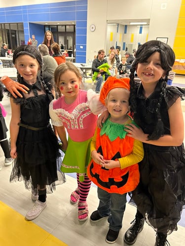 Mauston Montessori students and families had an October's Family Dinner and costume parade!