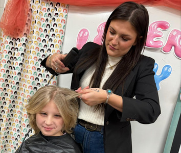 Ms. Walsh’s students were treated to a mini spa day where they received haircuts.