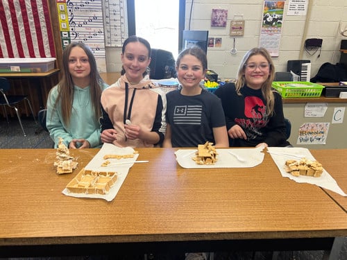 Students explored how music is created by breaking down one whole note using graham crackers.